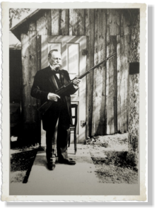 Paul Mauser holding a self-loading rifle model 06/08. All Rights Reserved.