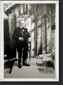 Paul Mauser holding a self-loading rifle model 06/08. All Rights Reserved.
